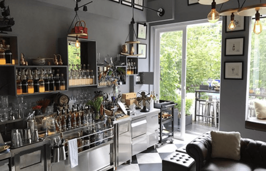 A photo the The Studio bar looking towards the leafy balcony