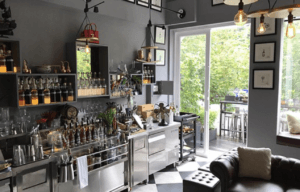 A photo the The Studio bar looking towards the leafy balcony